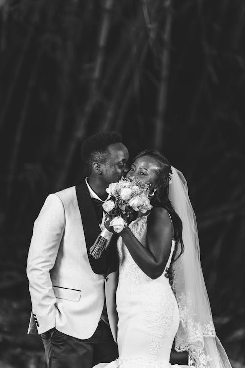 Groom Kissing the Bride on the Cheek 