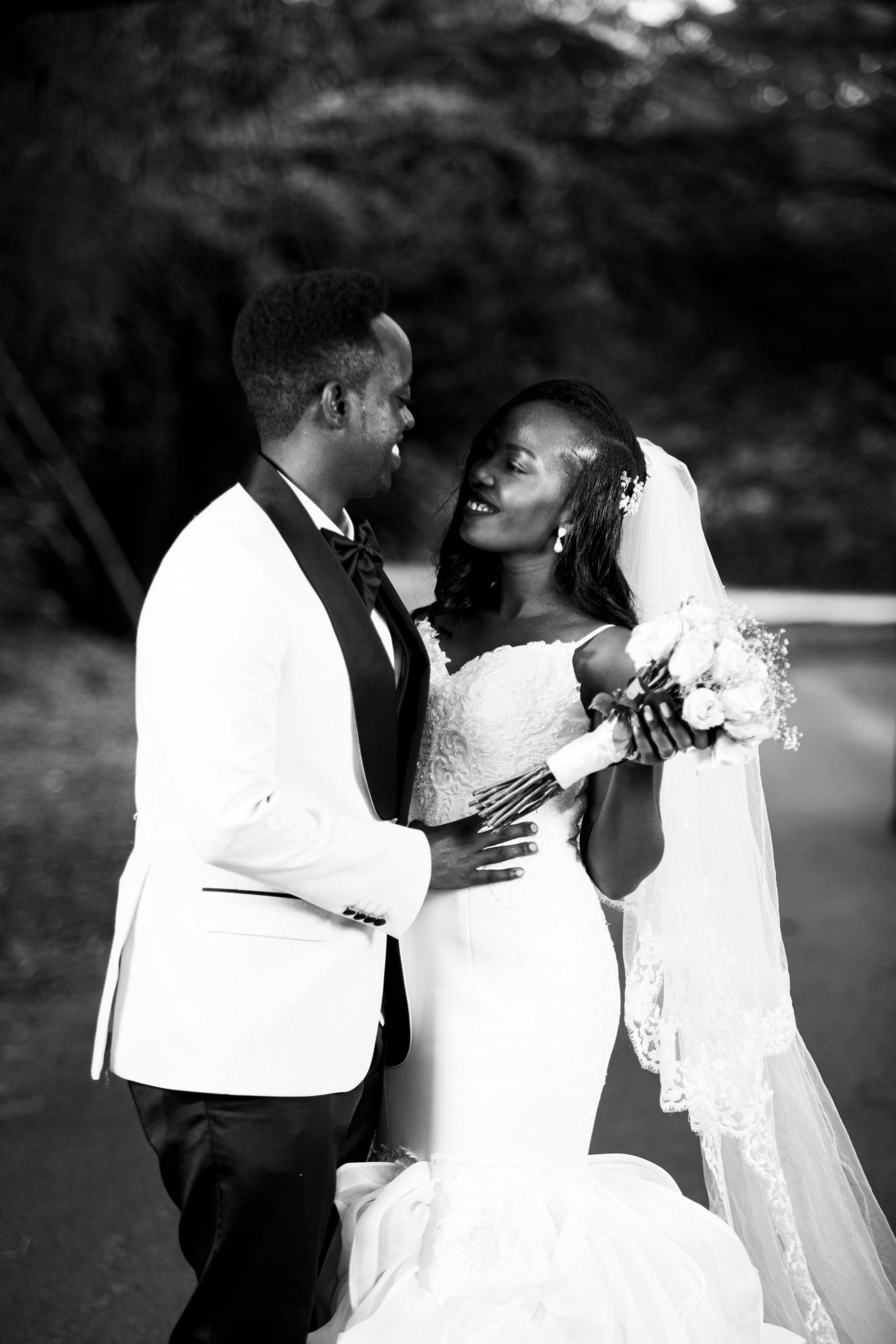A joyful moment captured between a bride and groom on their wedding day.