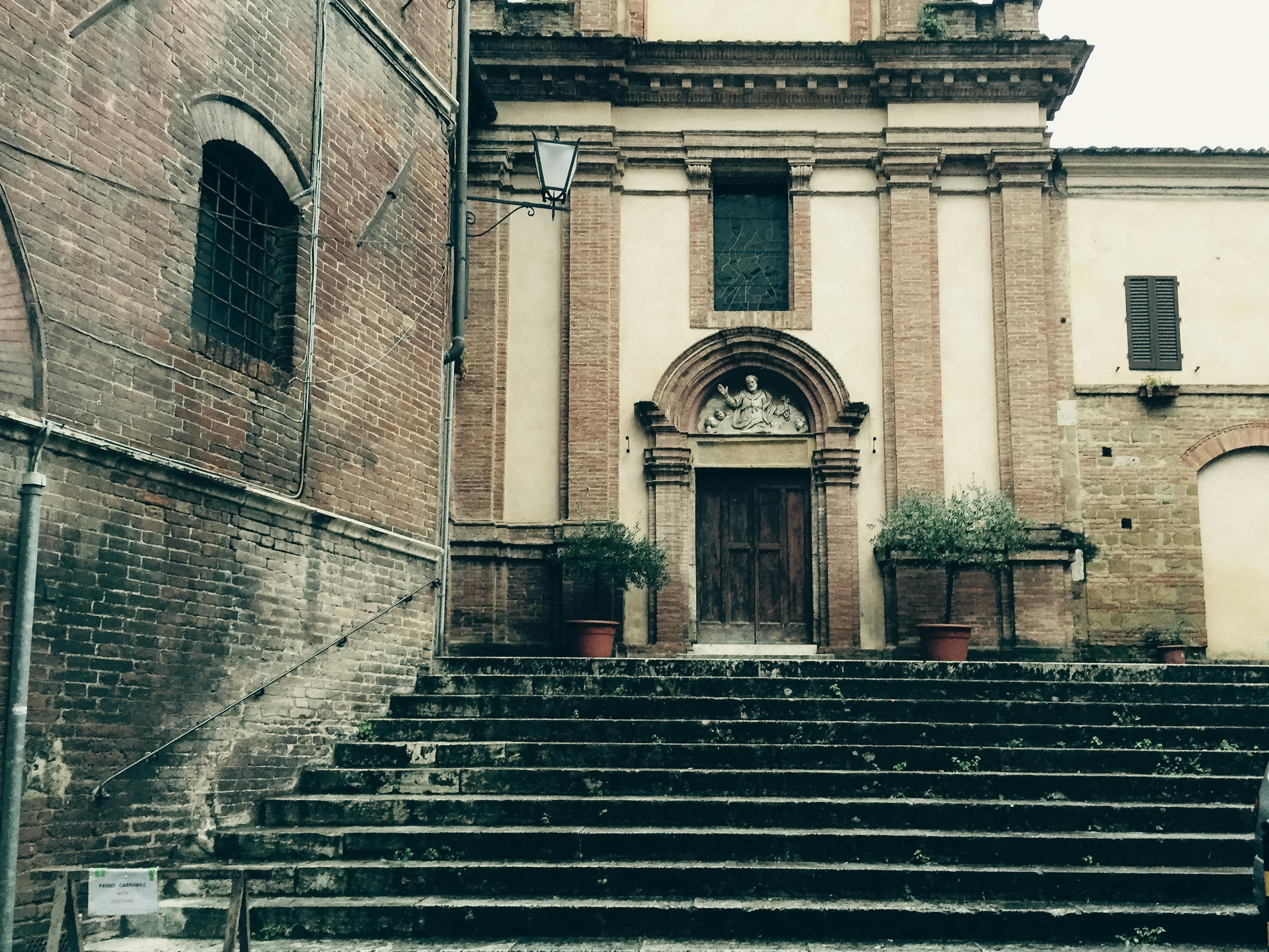 Entrance to San Pietro alle Scale Church in Siena, Italy · Free Stock Photo