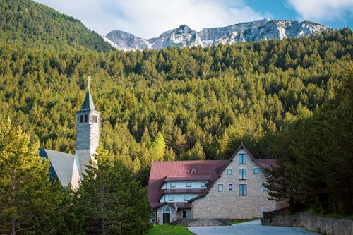 View of a House and Church in the Valley in Dinaric Alps, Bosnia and Herzegovina