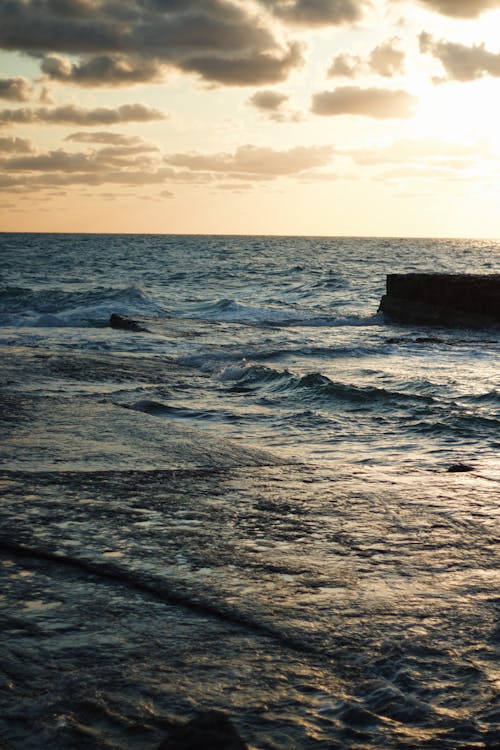 Foto d'estoc gratuïta de capvespre, Costa, mar