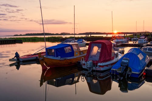 Motorboats at Marina on Lakeshore at Sunset