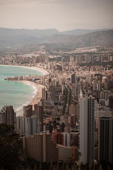 Stunning aerial view of Benidorm's urban landscape with beach and skyscrapers.
