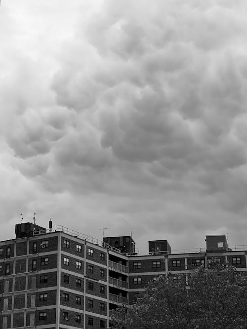 Cloudy Sky over Apartment Building