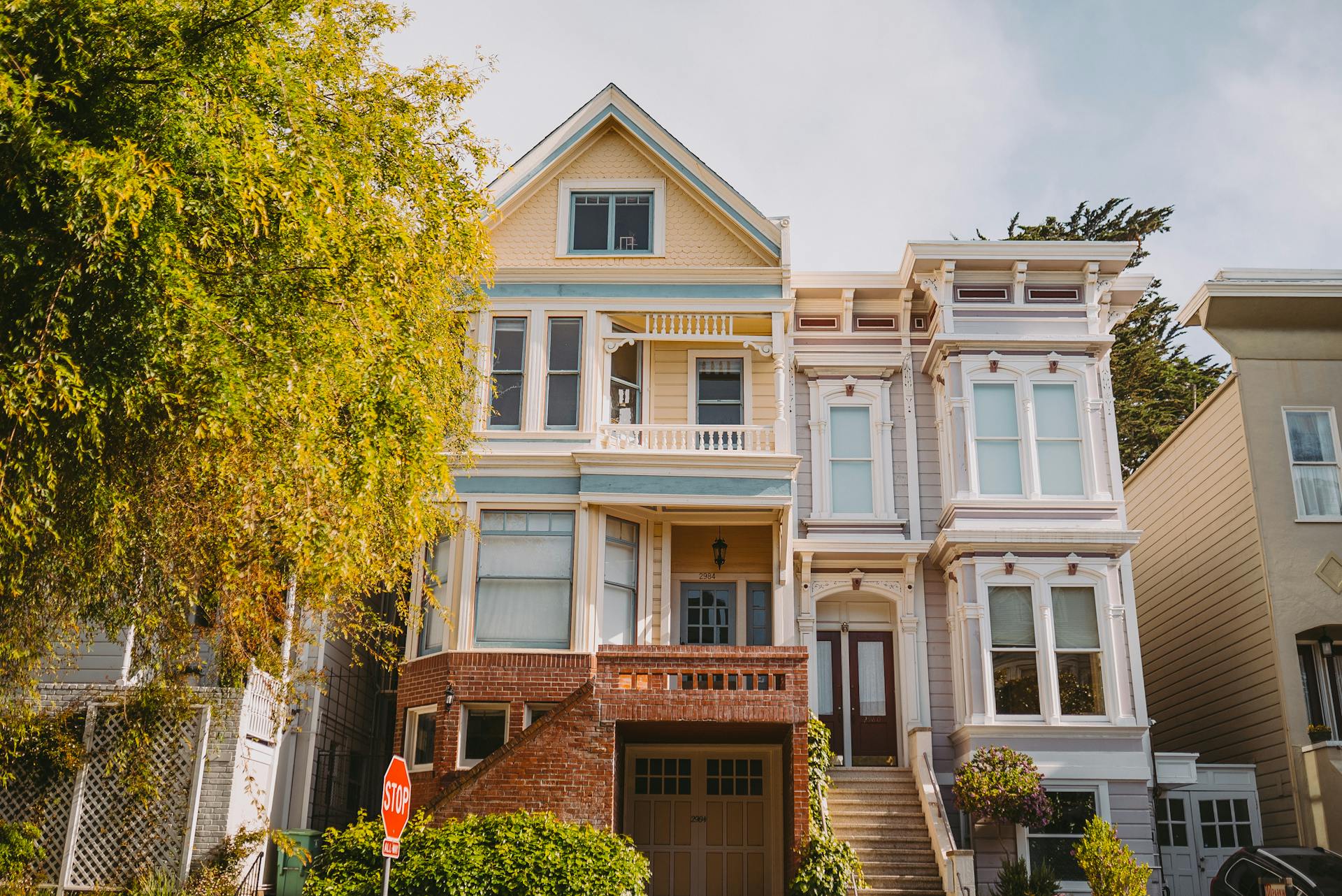 Front view of a charming Victorian townhouse capturing classic architecture and urban aesthetics.