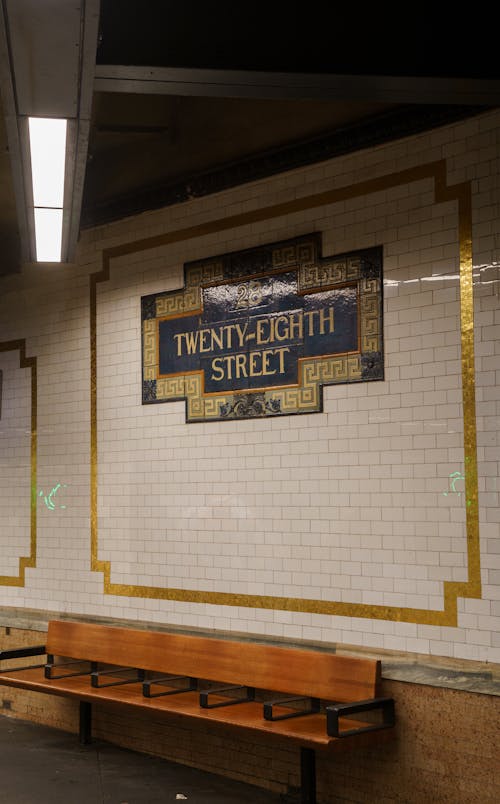 Twenty-eight Street Board on Wall in Subway in New York