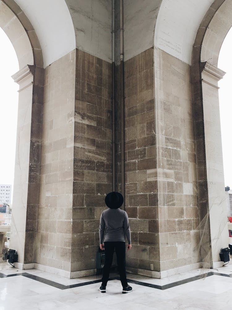 Tourist Looking At Arches