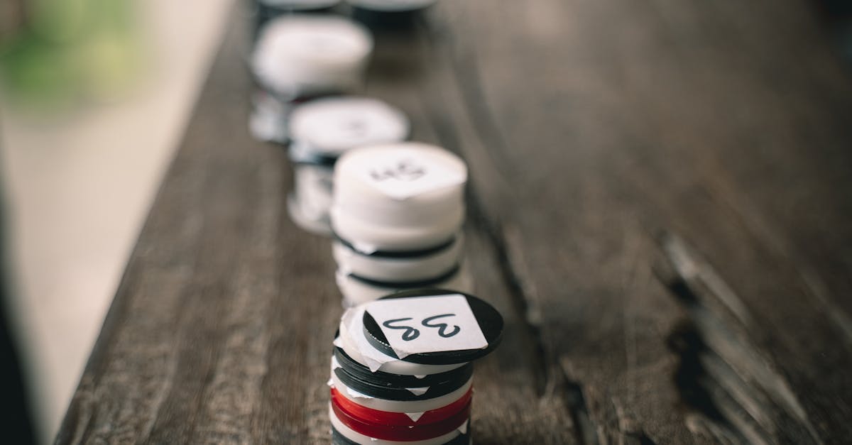 Close-up of a Stack of Numbered Tokens on a Wooden Surface · Free Stock ...
