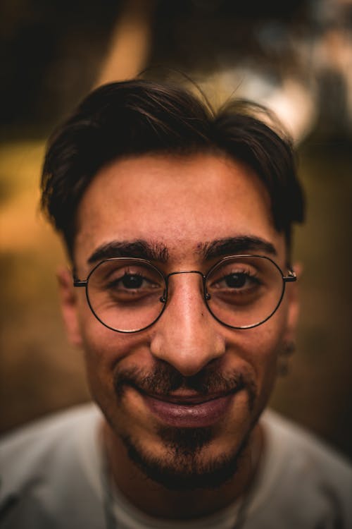 Smiling Face of Man in Eyeglasses
