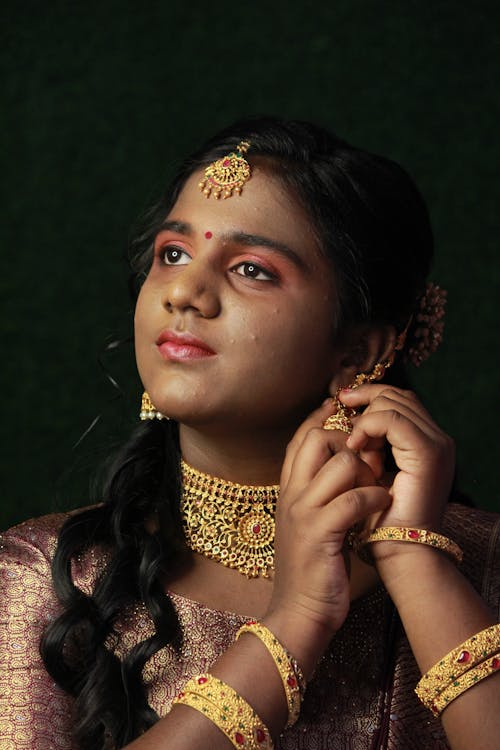 Portrait of Woman with Golden Jewelry