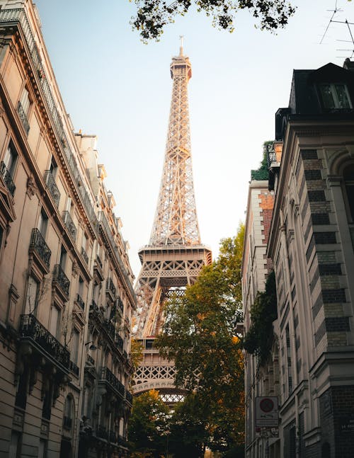 View of Eiffel Tower from city street in Paris