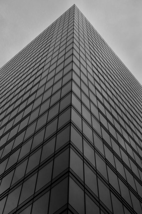 Free Black and white photo of a modern skyscraper in Brussels, Belgium. Stock Photo