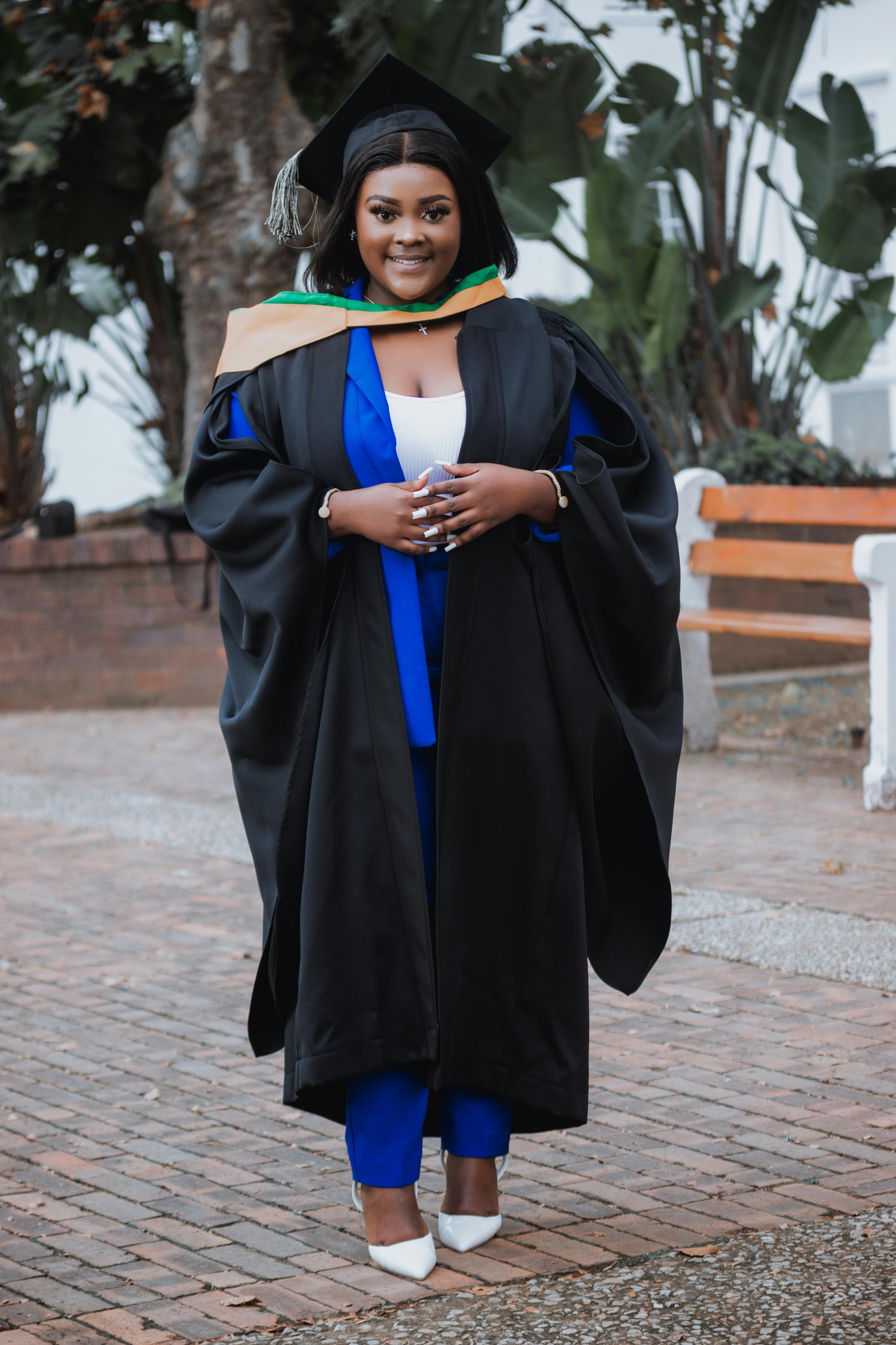 Black Doctoral Degree | Graduation photoshoot, Graduation picture poses,  Graduation poses