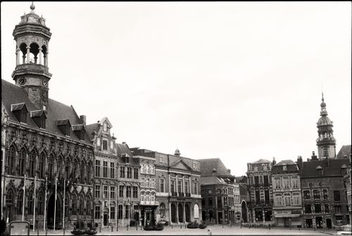 Free Black and white photo of historic buildings in a European square with ornate architecture. Stock Photo