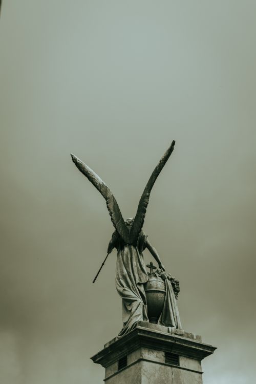 Free A stunning angel statue at La Recoleta Cemetery in Buenos Aires, representing religious art. Stock Photo