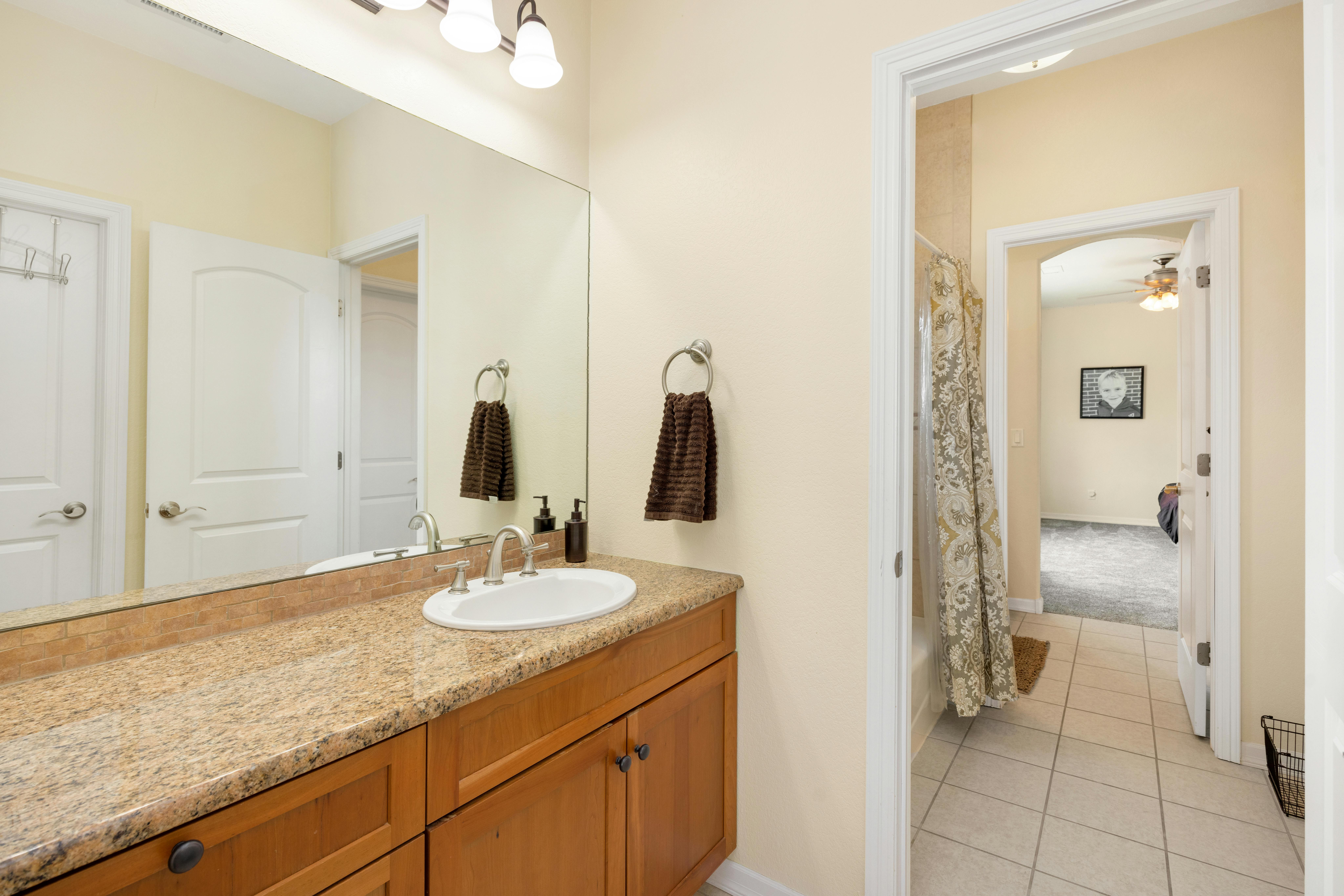A classic granite bathroom vanity with an undermount sink - Bathroom countertops Orlando
