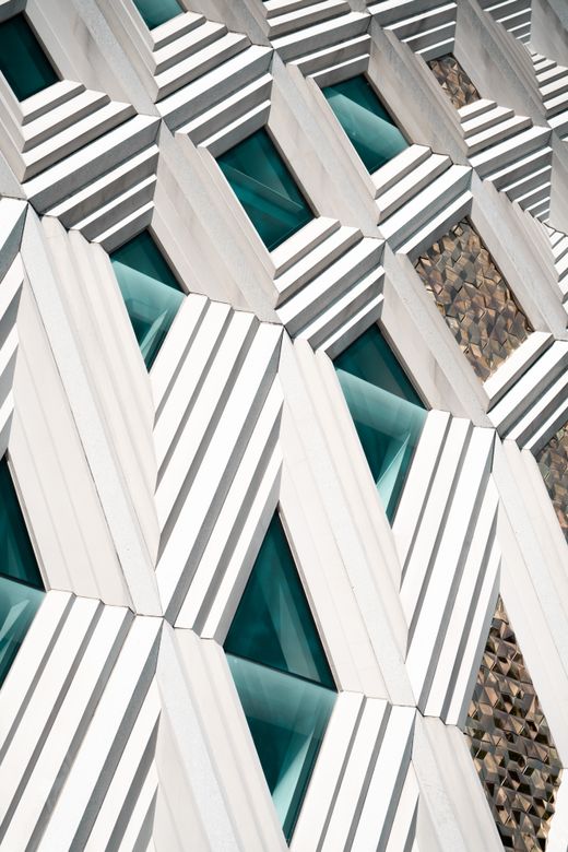 Pale facade against sky, photo by Arthur Swiffen on Pexels