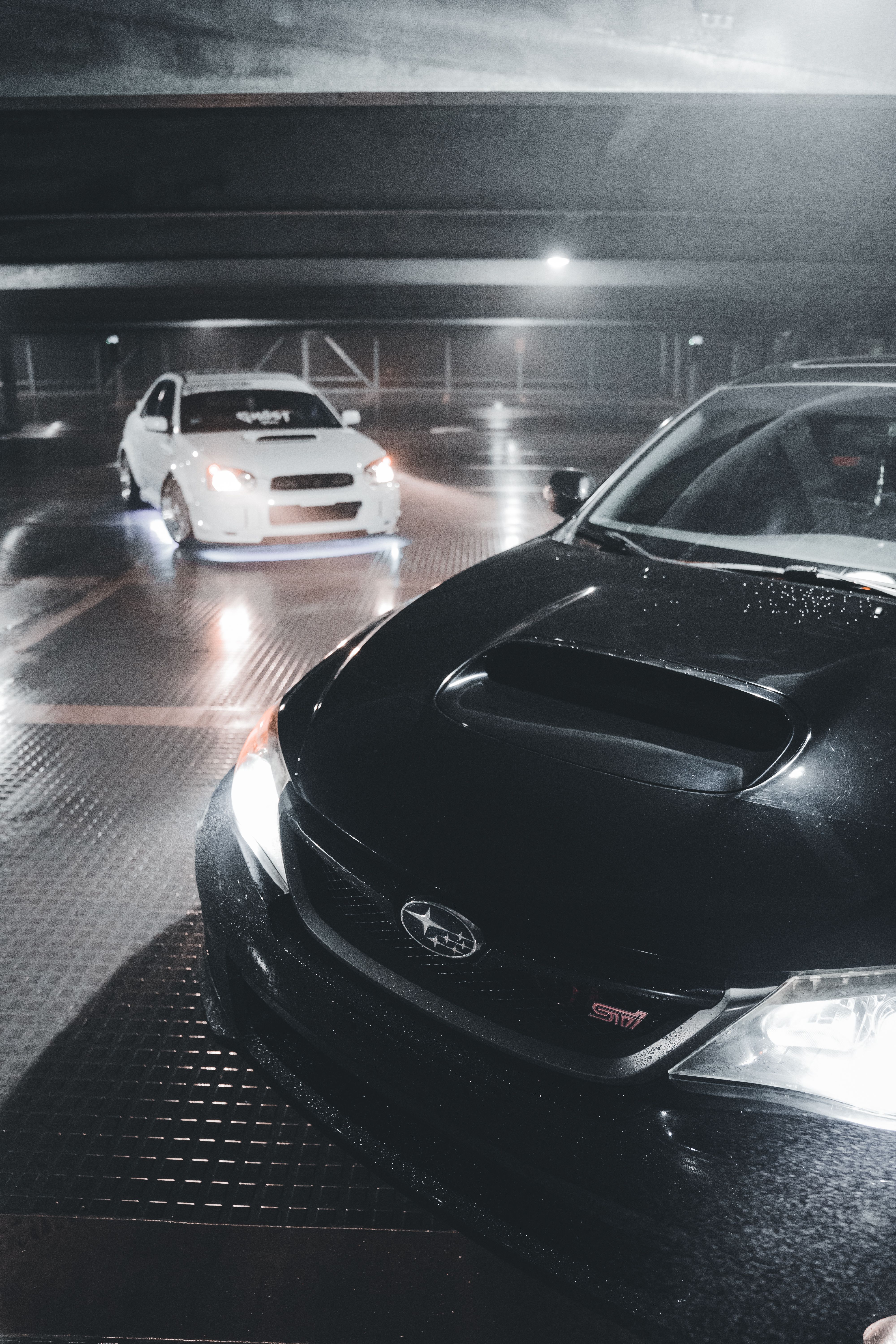 Custom sports cars at night