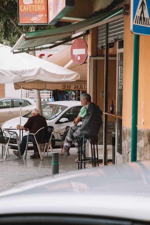 Darmowe zdjęcie z galerii z baldachim, fotografia uliczna, kawiarnia na chodniku