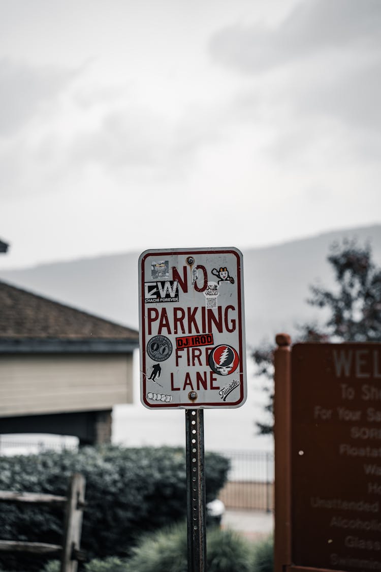 Stickers On Warning Sign