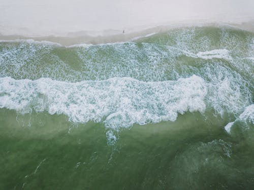 Free An aerial view of the ocean with waves Stock Photo