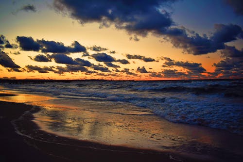 Foto profissional grátis de alaranjado, azul, litoral