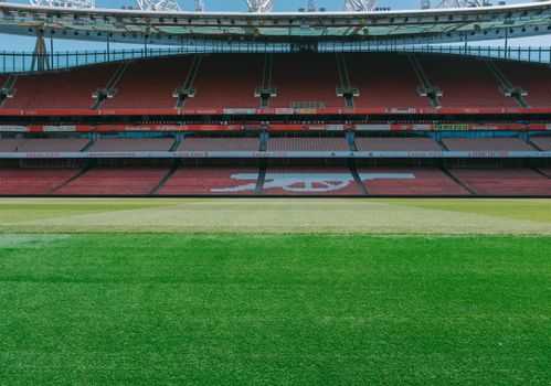 A view of the empty stands and football pitch at Emirates Stadium, London.