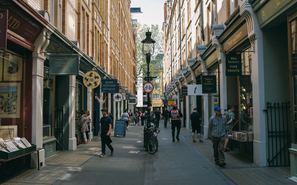 People visiting an independent local street