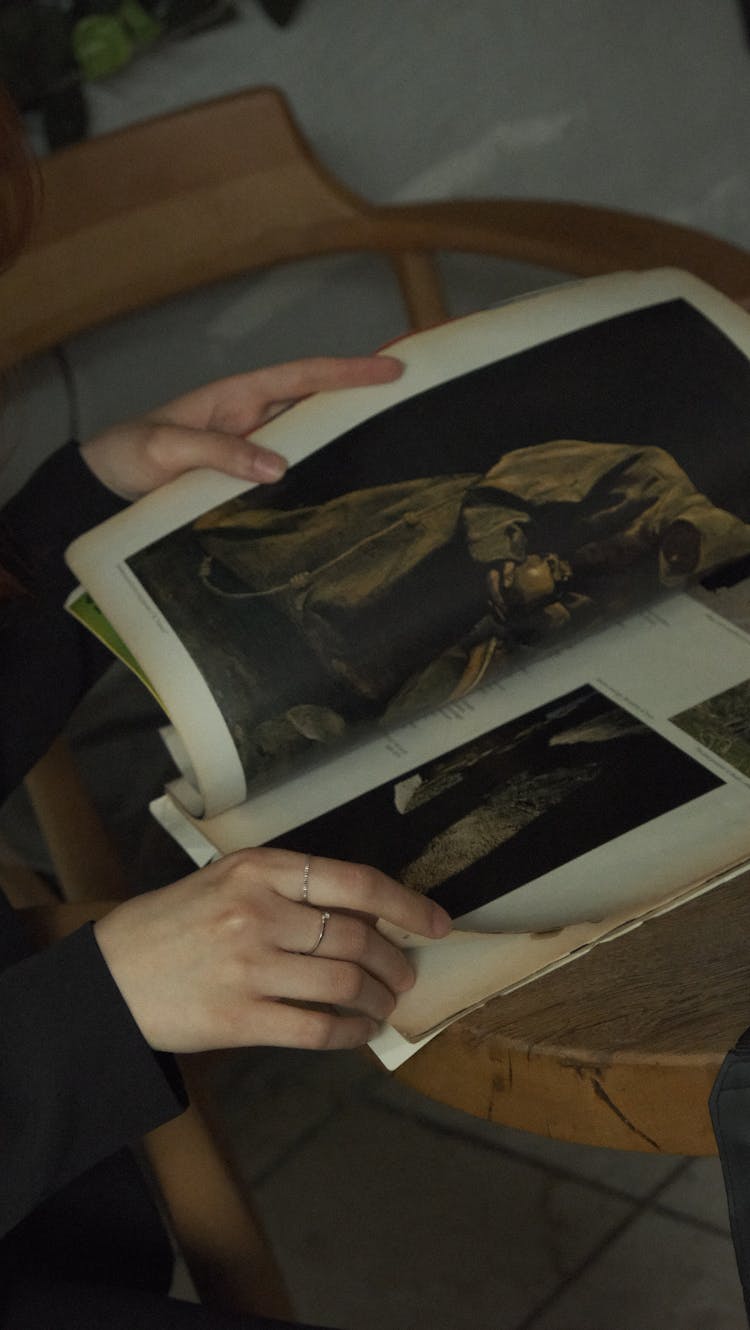 Woman Hands Holding Vintage Album