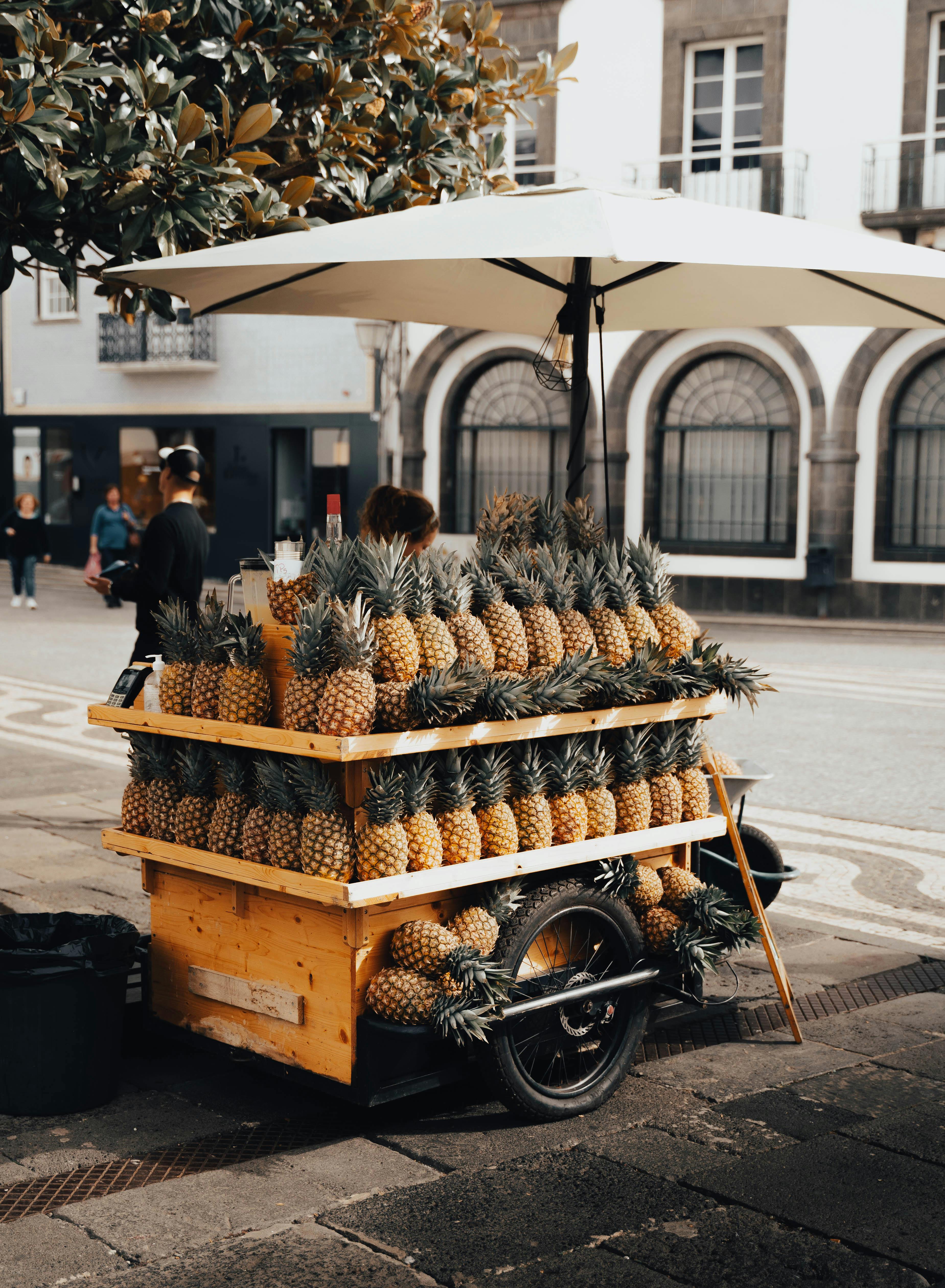 Stall with Pineapples on City Street · Free Stock Photo