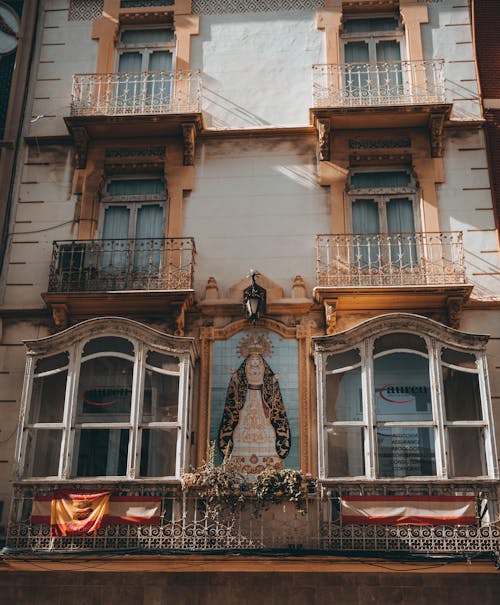 Residential Townhouse with the Mural of Virgin Mary on the Facade 