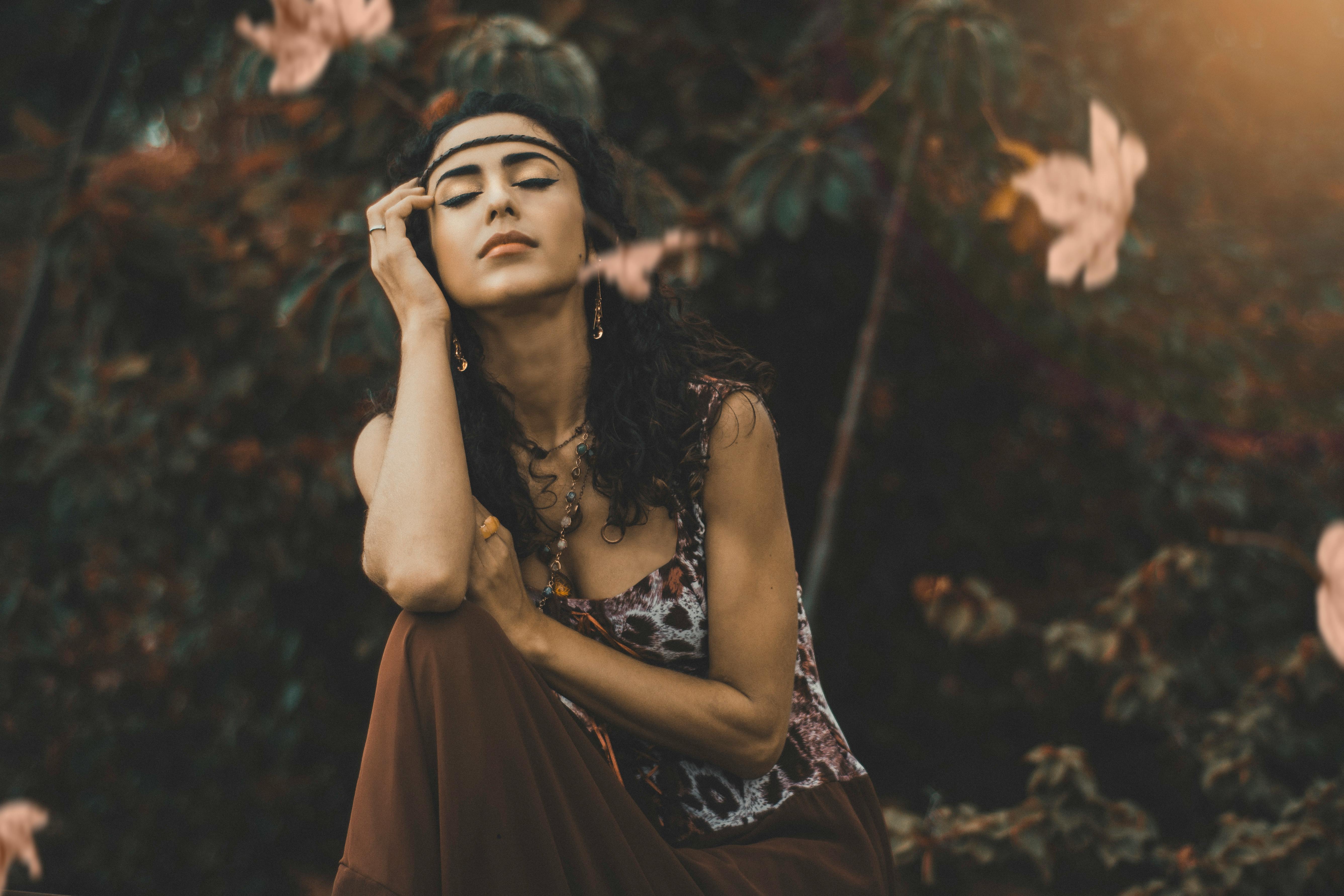 shallow focus of woman wearing sleeveless top