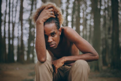 Photo of Man Holding His Head