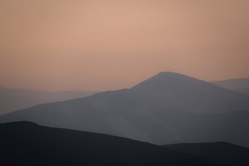 Silhouette of Mountains at Dusk 