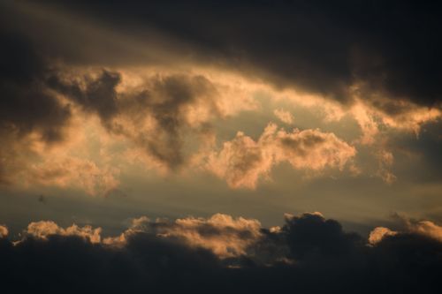 Free A mesmerizing cloudscape with dramatic lighting at sunset over Mashhad, Iran. Stock Photo