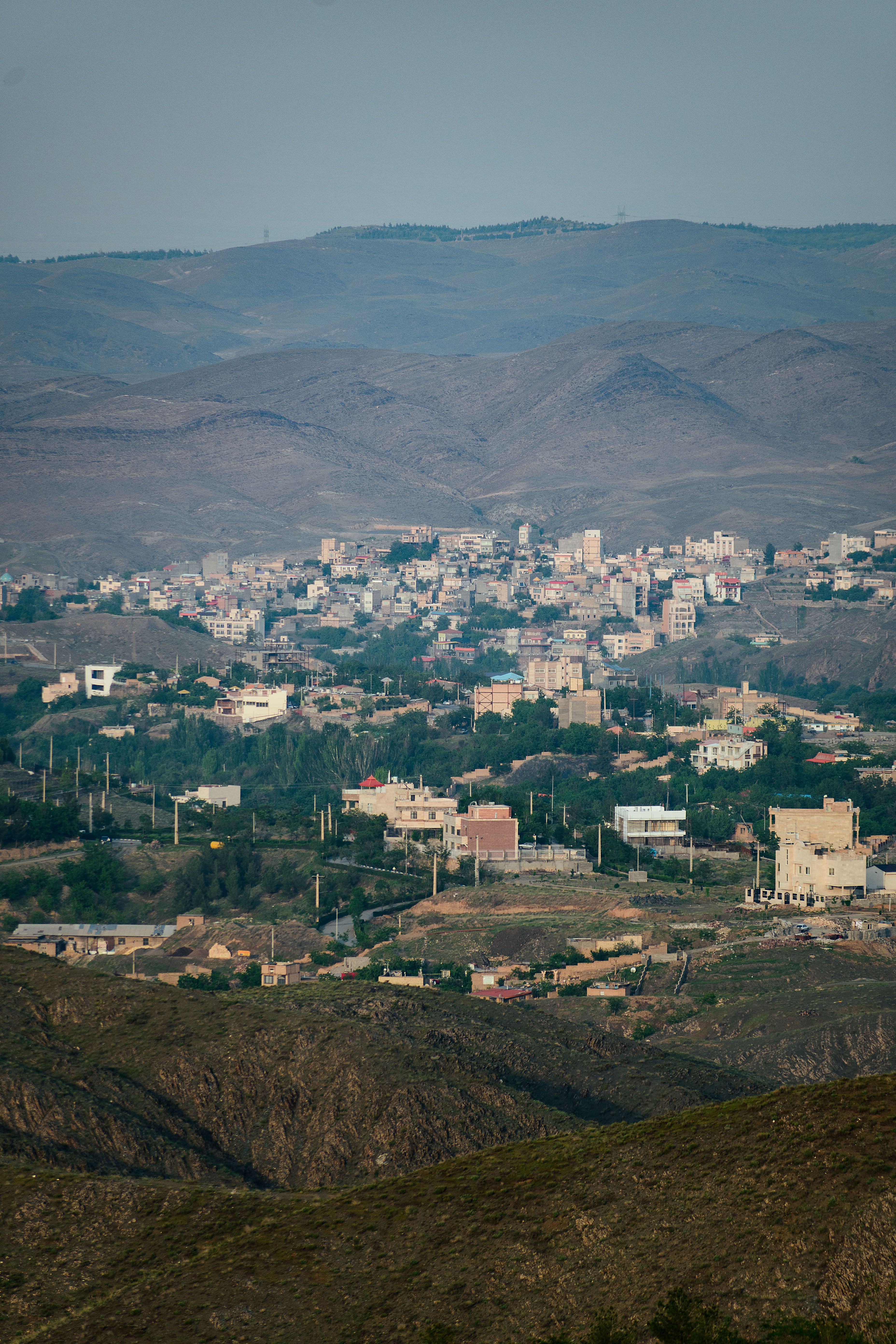 Aerial View of a Town in a Mountain Valley · Free Stock Photo