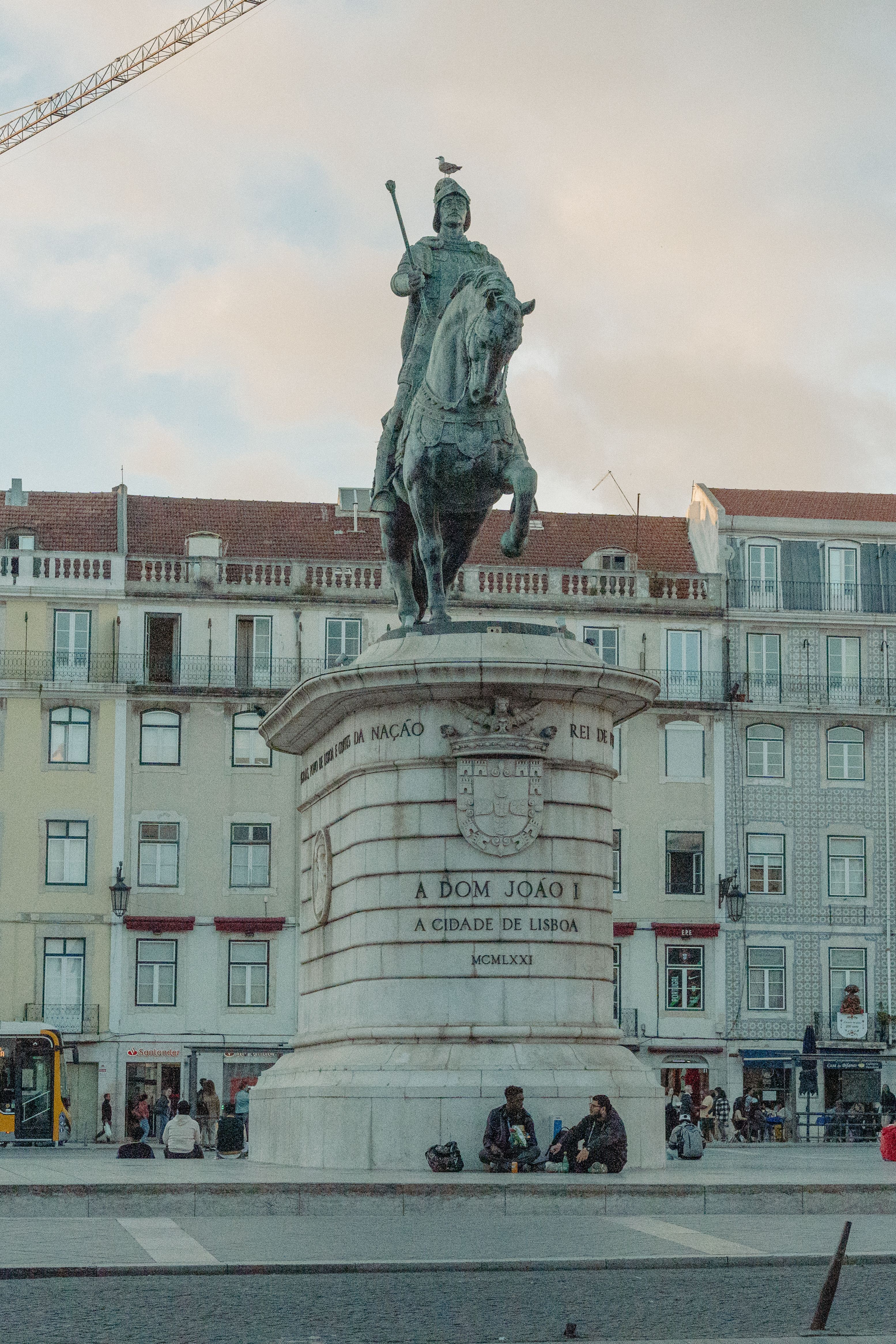 A striking view of the Dom João I statue in Lisbon's historic Praça da Figueira.