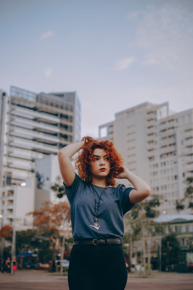 Photo Of Woman Touching Her Hair