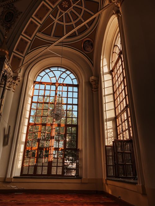Free Sunlight filtering through windows at Aziziye Mosque, showcasing architectural elegance in Konya, Türkiye. Stock Photo