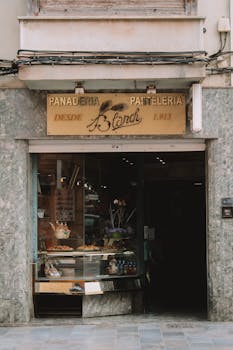 Charming vintage entrance of a Spanish bakery and patisserie established in 1913.