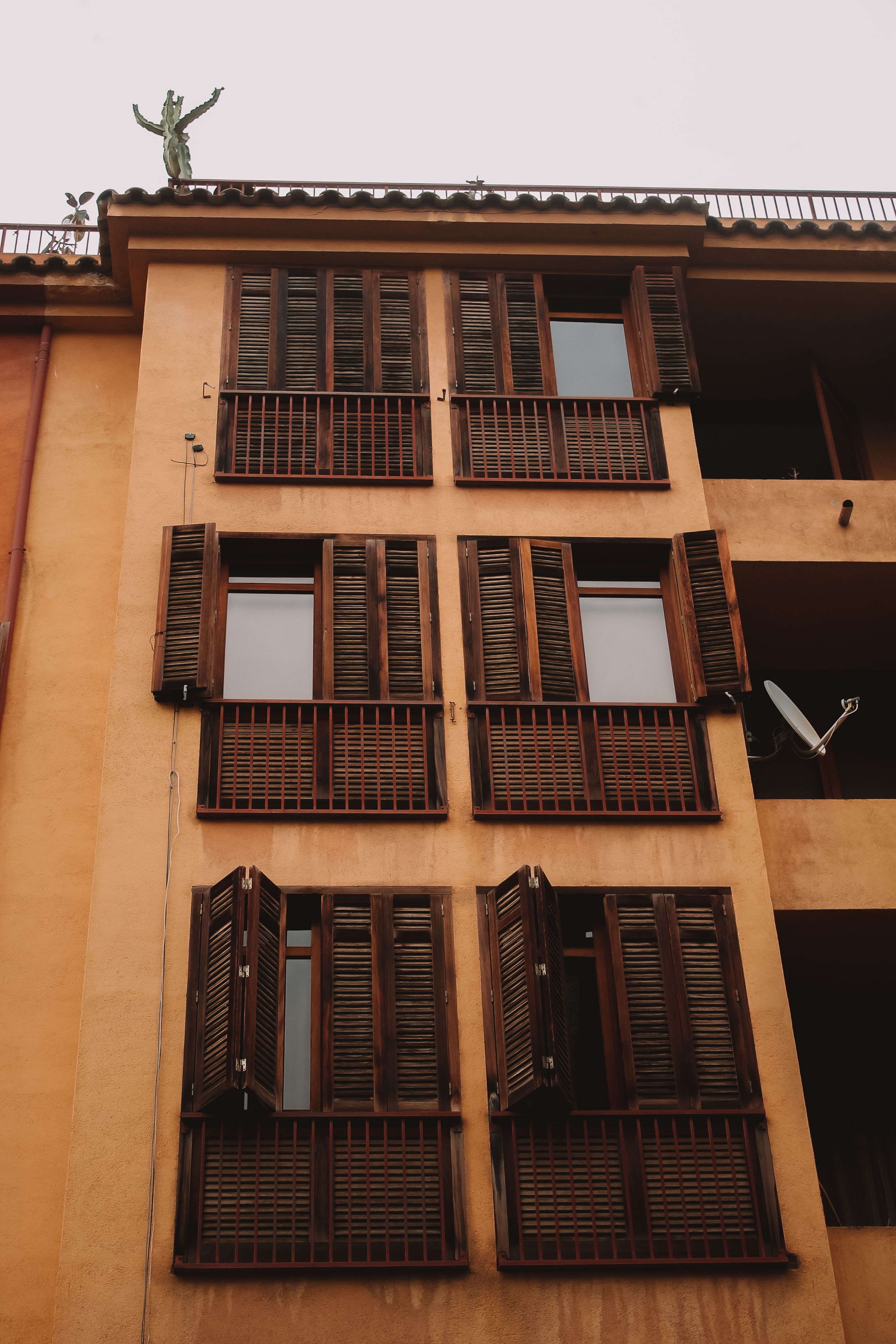 Wooden Shutters of Residential Building · Free Stock Photo