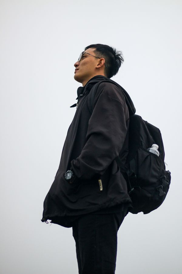 Young man in windbreaker jacket