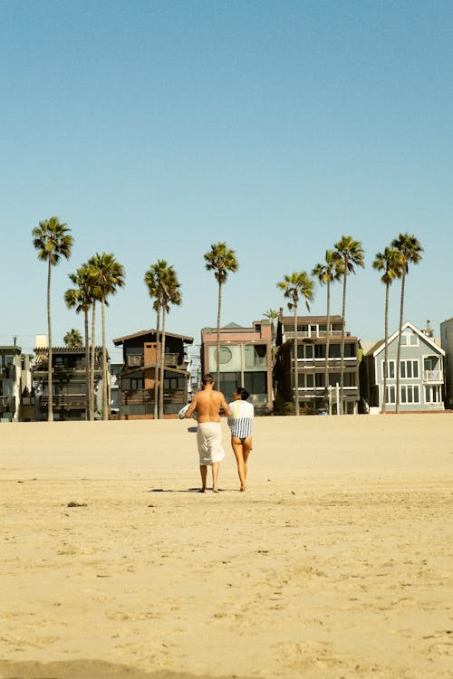 Couple Walking on Tropical Beach