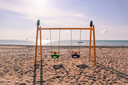 A Child Swing on the Beach 