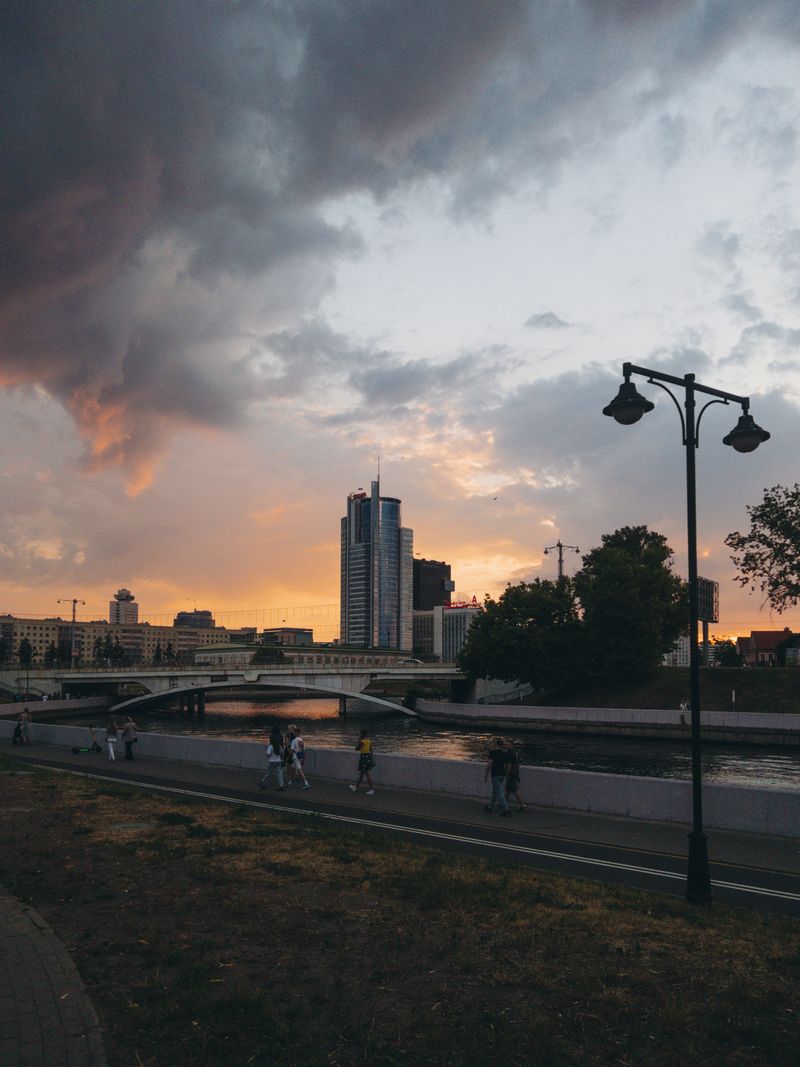 River and city skyline at sunset
