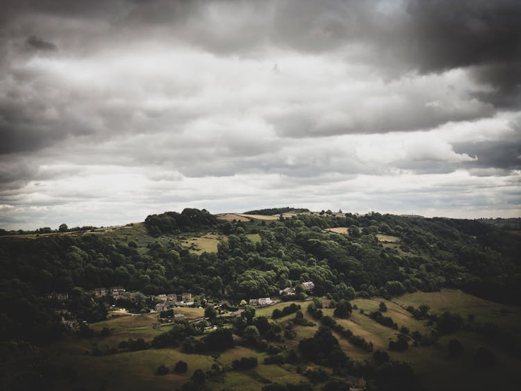 Bird's Eye View Of Mountain Under Cloudy Sky