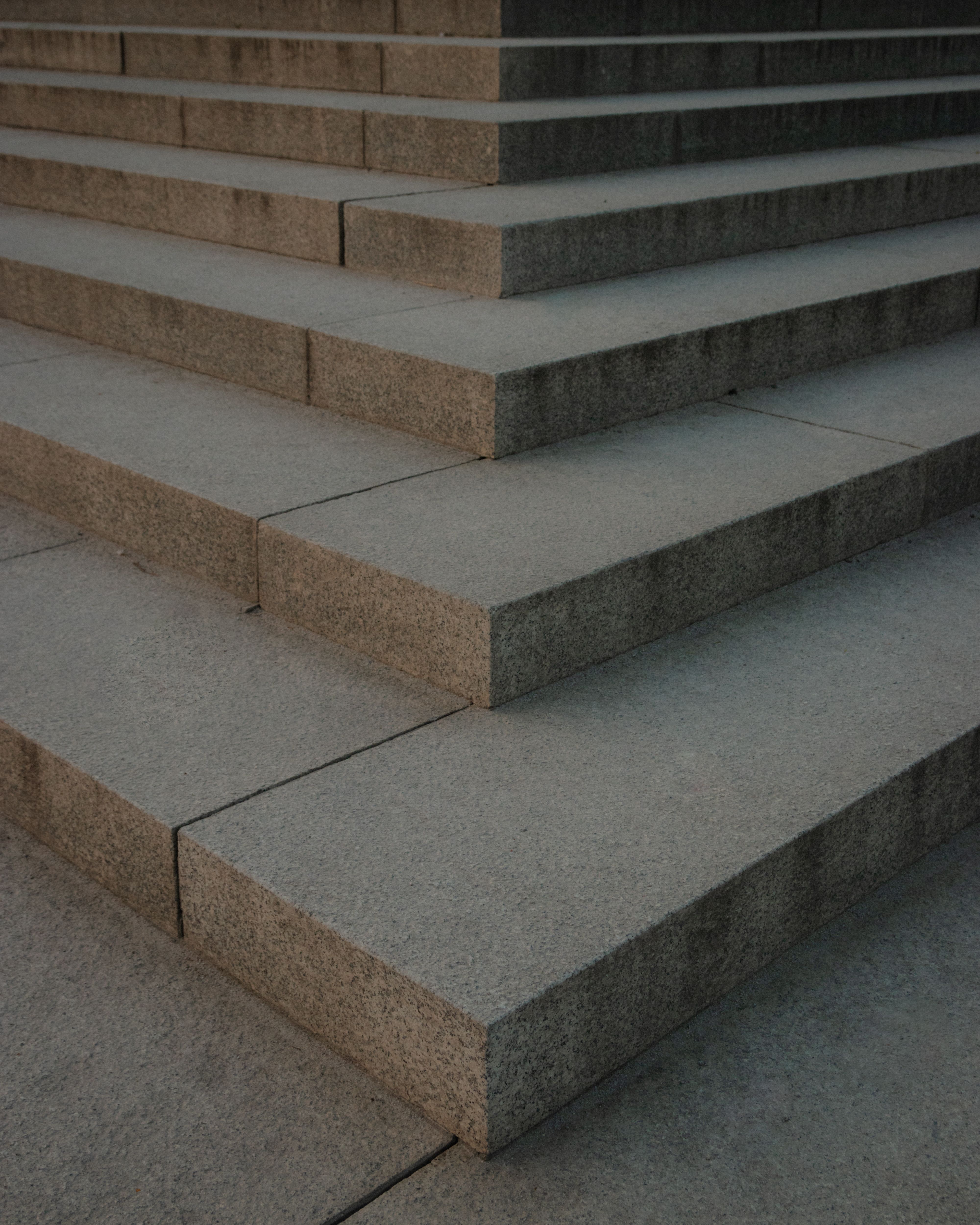 A geometric view of modern concrete steps featuring clean architectural lines.