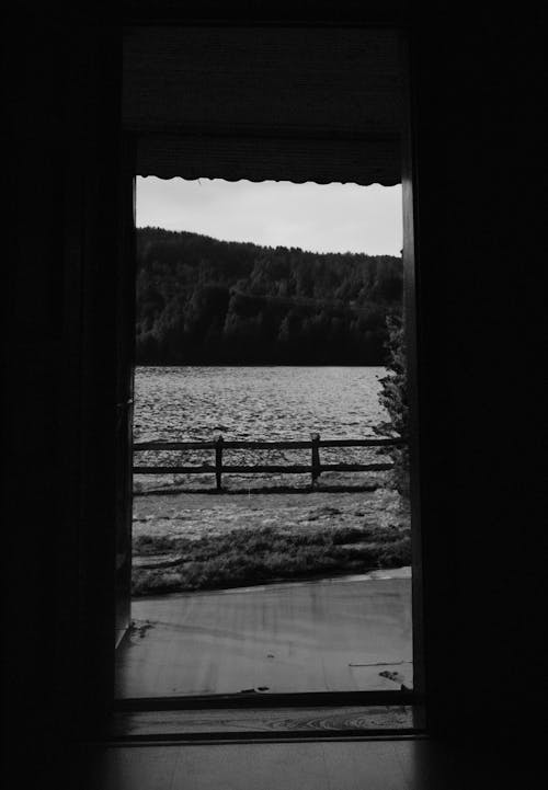 River behind Doorway in Black and White