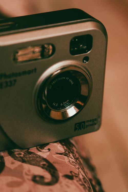 Free Close-up of a vintage camera showcasing its retro design elements for nostalgia enthusiasts. Stock Photo