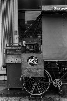 Vintage street food cart on city streets of Ponorogo, East Java, Indonesia.